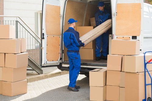House removals planning in Hanwell with moving boxes and local streets