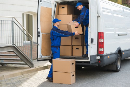 Local moving assistance in Hanwell with packed boxes ready for transport