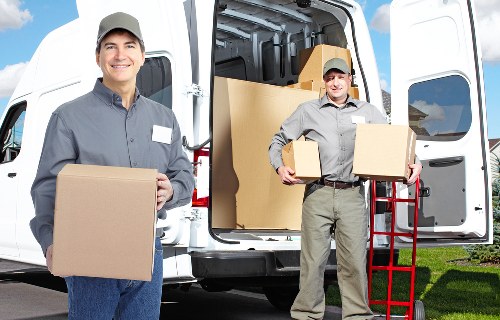 Removals team handling stairs in Hanwell flat move