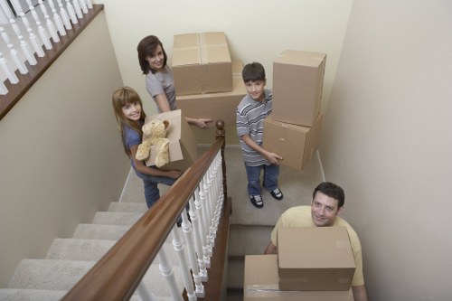 Fragile items and storage boxes organized for student removals